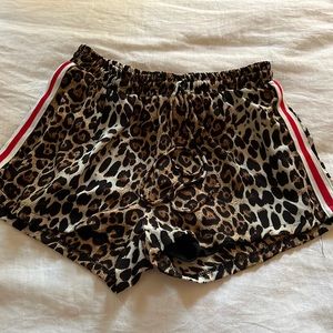 Vintage Havana shorts with red stripe on side.